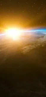 Sunrise over Earth's horizon seen from space, in golden and blue hues.