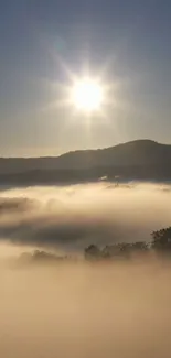 Sunrise illuminating a misty mountain landscape, captured beautifully.