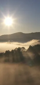 Sunrise above misty hills and forests, capturing natural tranquility.