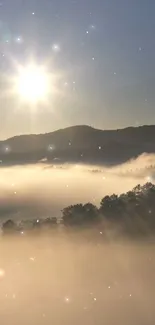 Sunrise over misty mountains with glowing sun and soft mist.