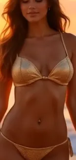 Woman in a golden bikini at sunset on the beach.
