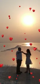 Romantic sunset beach dance with floating heart balloons.