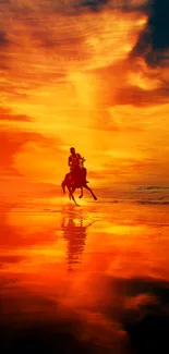 Silhouette horseback ride on beach at sunset.