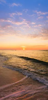 Tranquil sunset over a serene beach with gentle ocean waves.