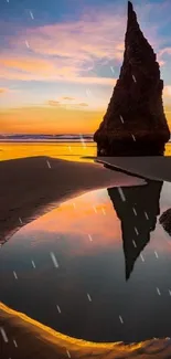 Scenic beach rock reflection during sunset, with vibrant sky colors.