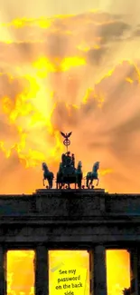 Silhouette of monument against vibrant sunset sky.