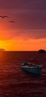 Boat floating on ocean under a vibrant sunset, orange sky and birds.