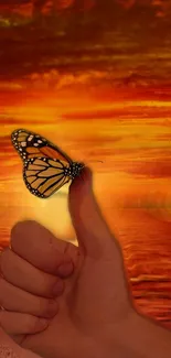 Butterfly on thumb against orange sunset.