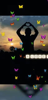 Silhouette with butterflies at sunset, forming a heart.