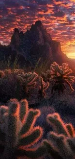 Vibrant desert sunset with cactus and mountain silhouette wallpaper.