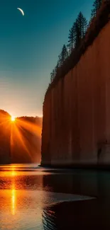 Canyon at sunset with golden reflections in water.