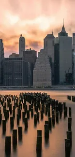 Breathtaking sunset over a cityscape with silhouetted skyscrapers.