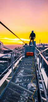 Rooftop view of a sunset with a vibrant cityscape background.