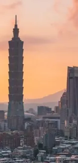 Sunset cityscape with skyscrapers and orange sky, ideal for urban mobile wallpaper.