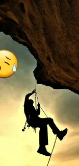 Silhouette of a climber with sunset and emoji.