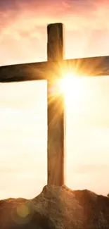 Mobile wallpaper of a cross at sunset symbolizing peace and hope.