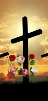 Silhouetted crosses with roses against a sunset sky.