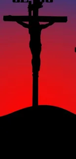 Crucifixion silhouette at sunset with red and purple gradient.