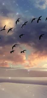 Mobile wallpaper with birds flying over desert dunes at sunset.