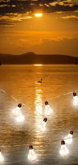 Serene sunset with glowing fairy lights over a tranquil lake.