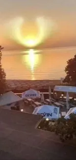 Triple sunset halo above the ocean with golden reflections.