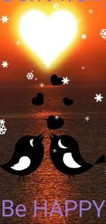 Sunset with heart-shaped glow and birds, inspiring mobile wallpaper.