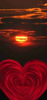 Stunning sunset with a glowing red heart on mobile wallpaper.