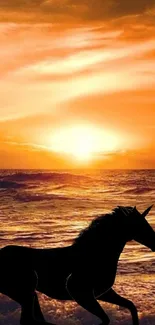 Horse silhouette against sunset over ocean wallpaper.