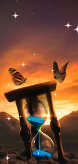 Hourglass and butterflies at sunset with vivid scenery.