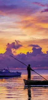 Man in boat at sunset with vibrant purple sky and serene lake.