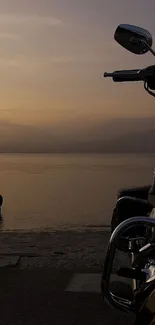 Motorcycle at a scenic lakeside during sunset, showcasing a serene landscape.