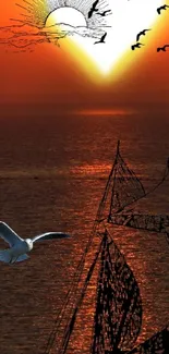 Artistic sailboat at sunset with birds flying over the ocean.