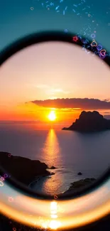 Circular lens view of ocean sunset with island silhouette.