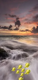 Ocean sunset with waves and golden fish swimming.