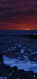 Ocean waves under a vibrant sunset sky.