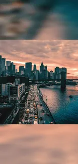 Vibrant sunset over cityscape and river.