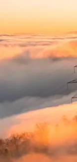 Orange sunset clouds with a silhouetted pylon structure in the foreground.