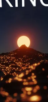 Fiery sunset over mountain peak with glowing water reflections.