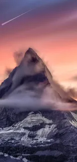 Stunning sunset behind a majestic mountain peak.