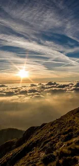 A stunning sunset over mountain peaks with a vibrant sky and scattered clouds.