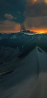 Stunning sunset over a mountain ridge with glowing sky.