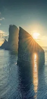 Stunning sunset over ocean cliffs with sun rays reflecting on the water.