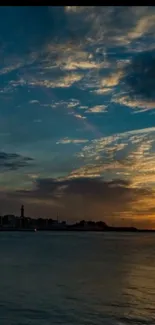 Stunning sunset over the ocean with vibrant clouds and a serene seascape.