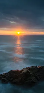 Ocean waves at sunset with dramatic skies and distant horizon.