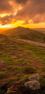 Sunset over green hills with dramatic skies.