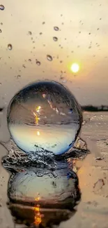 Sunset reflecting in a crystal ball with water droplets.