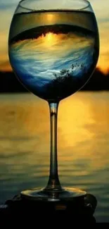 Vibrant sunset reflected in a wine glass over a tranquil lake.