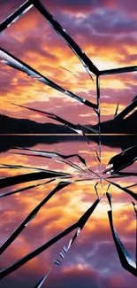 Cracked glass over sunset lake reflection wallpaper.