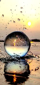 Crystal ball with sunset reflection on water surface, golden lighting.