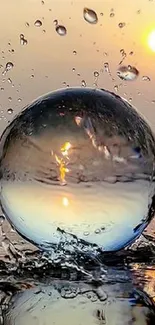 Crystal ball reflecting sunset over water with droplets captured in motion.